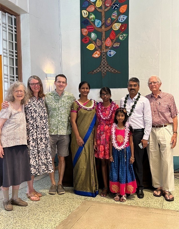 A group of people posing for a photo Description automatically generated