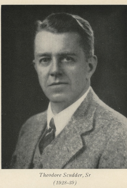 A person in a suit and tie Description automatically generated